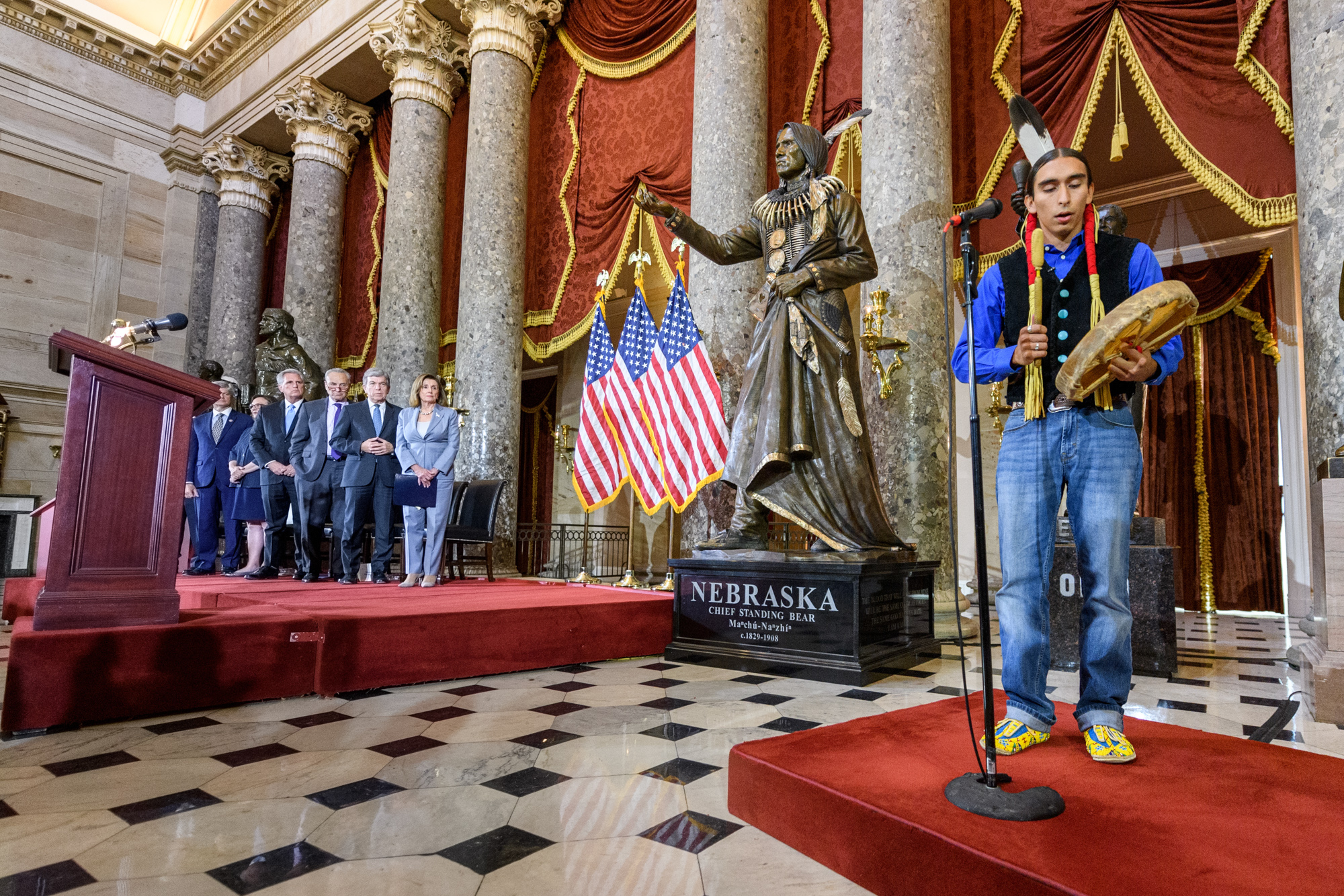 The ceremony included traditional drumming and singing from a descendant of Chief Standing Bear.