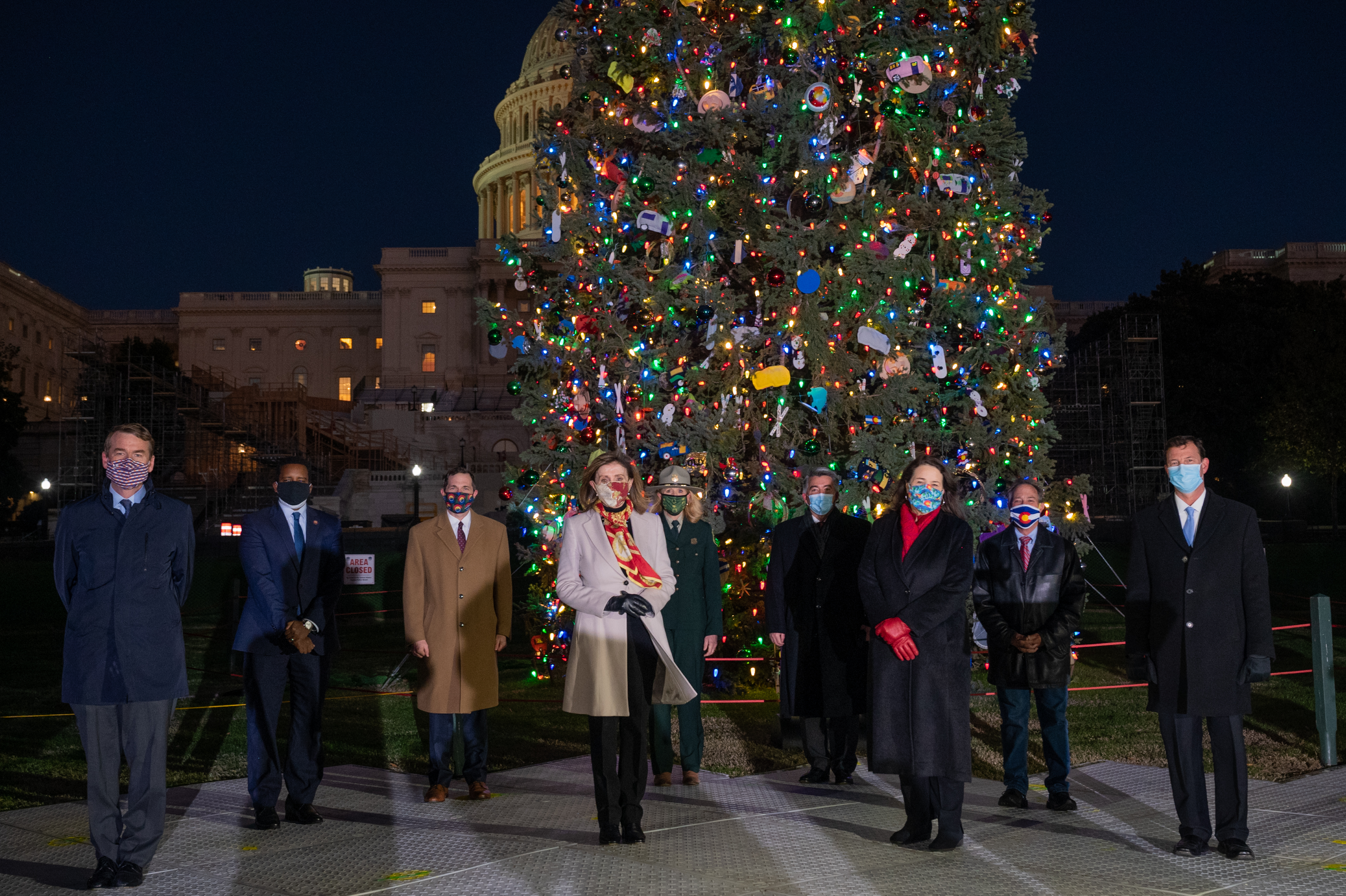 Photo of members of the Colorado Congressional Delegation gathered to see the Capitol Christmas Tree