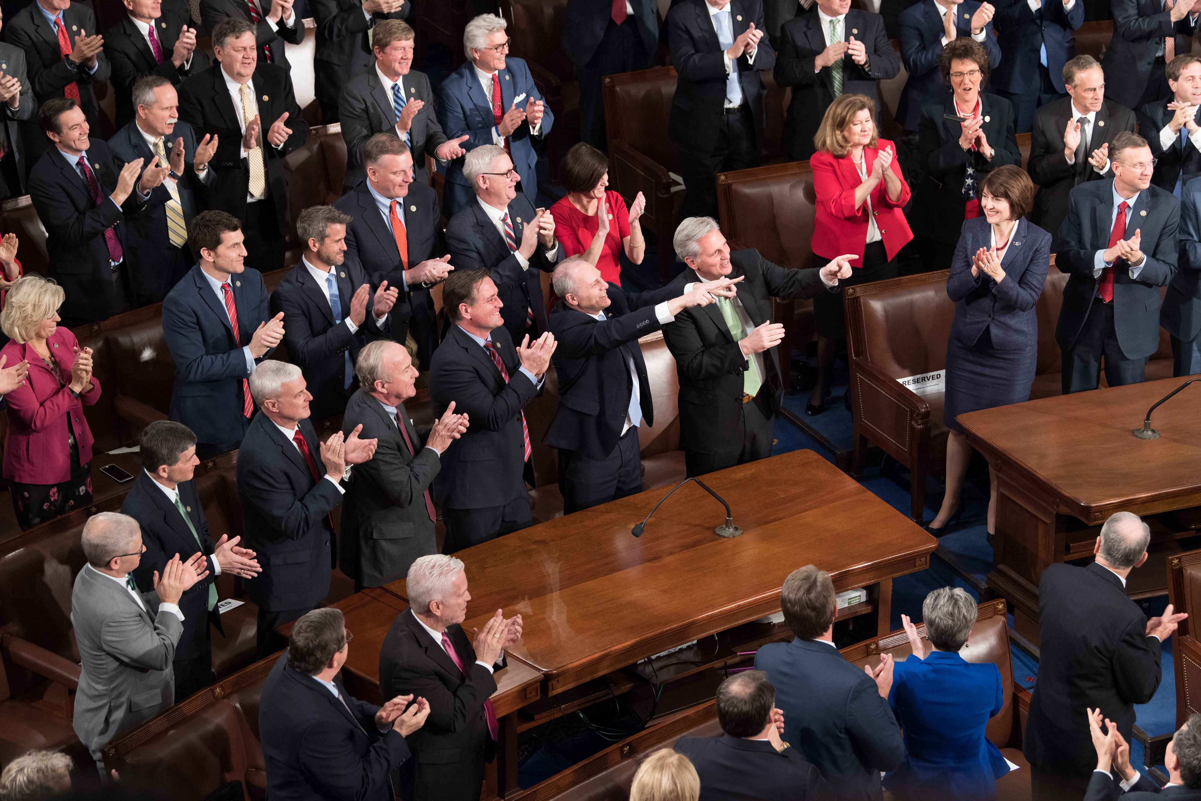 Majority Whip Steve Scalise points back at President Donald Trump during the State of the Union 