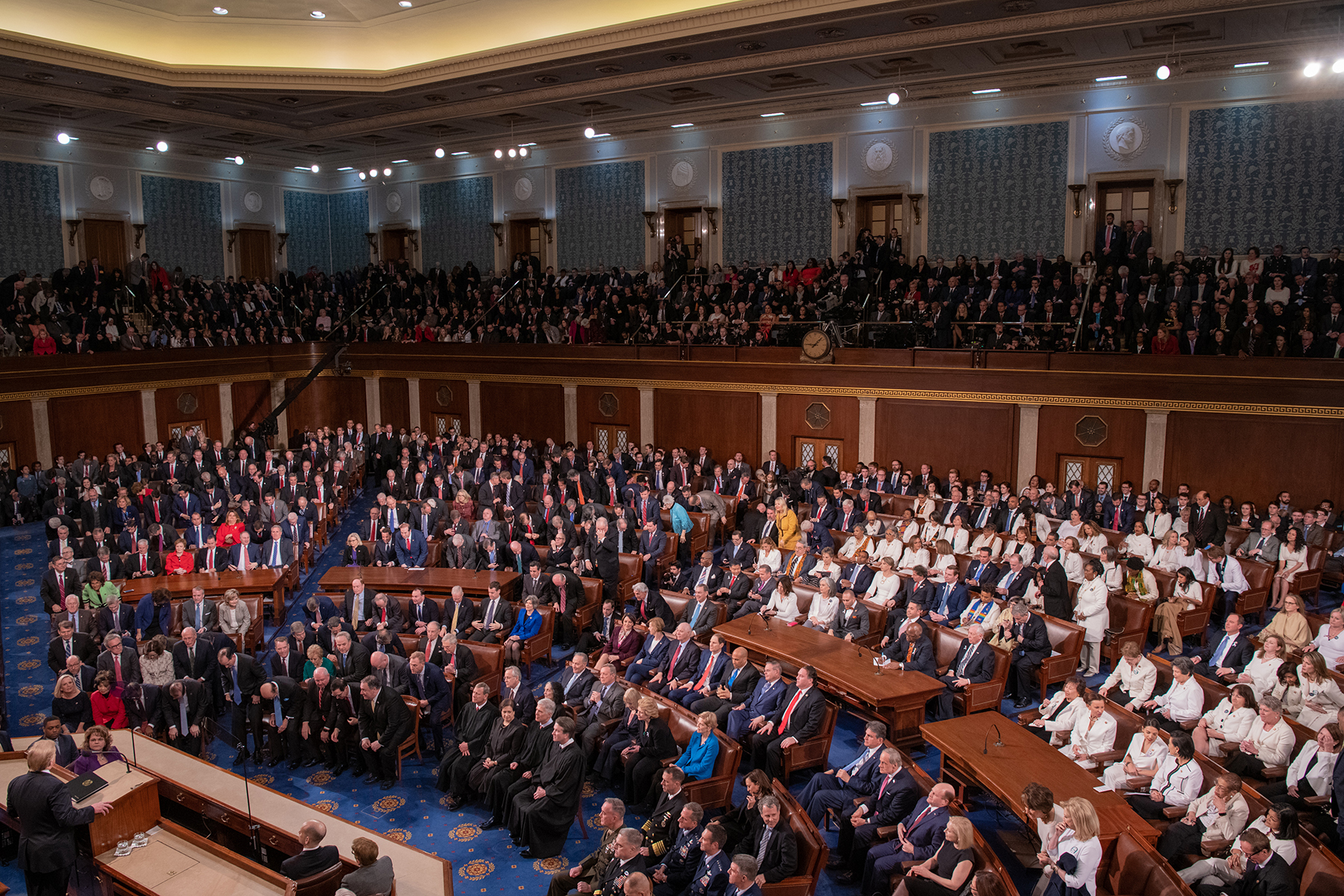 Members of Congress and inguished guests gathered to hear President Donald Trump