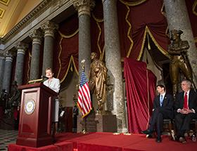 Representative Marcy Kaptur (OH-9) standing behind a podium